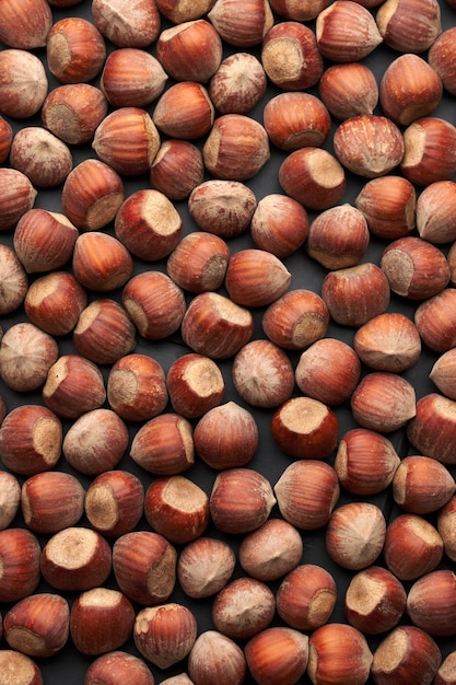 Whole hazelnuts nuts with shell closeup studio shot