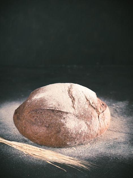 Whole homemade sourdough rye bread copyspace