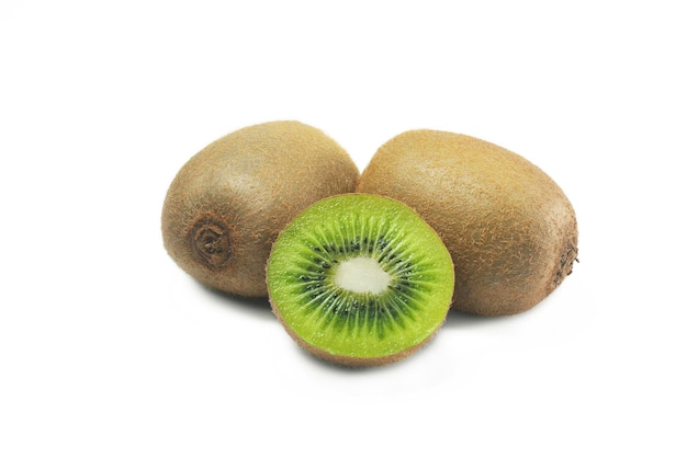 Whole kiwi fruit and half kiwi fruit on white