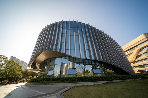 The whole or part of modern architecture with glass and steel structure under backlight