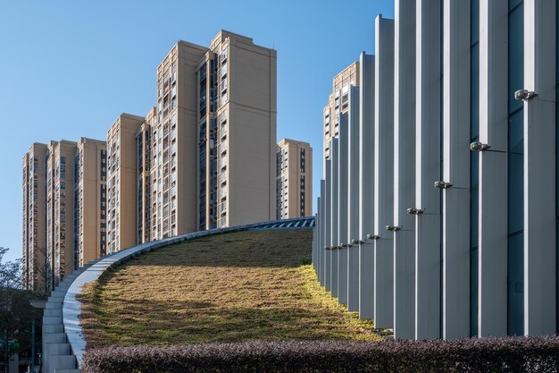 Photo the whole or part of modern architecture with glass and steel structure under backlight