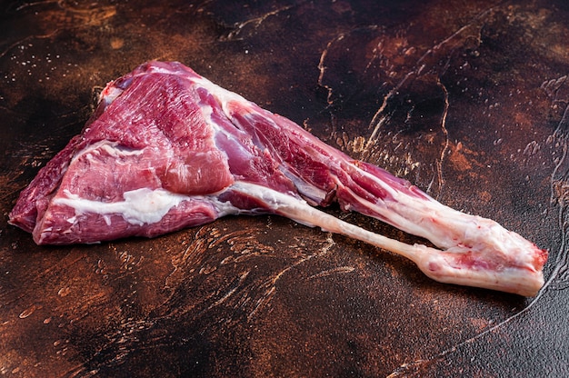 Whole raw lamb leg meat on the bone