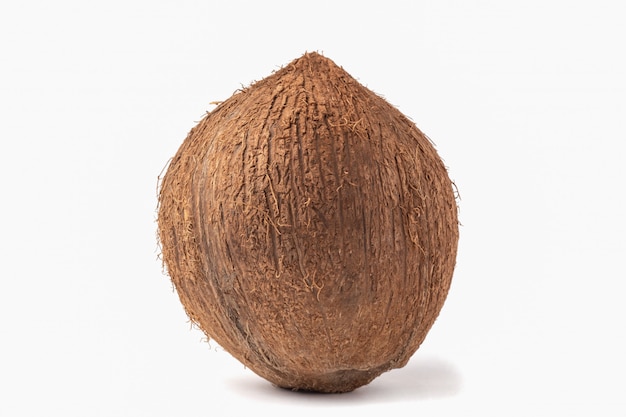 Whole ripe coconut isolated on white background.