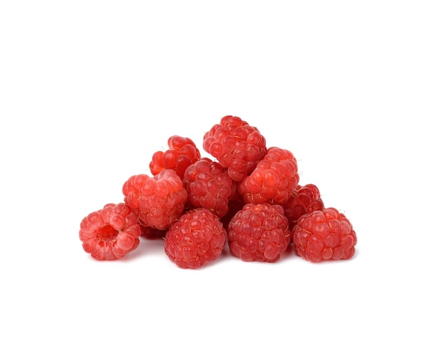 Whole ripe red raspberries on a white background, summer berry