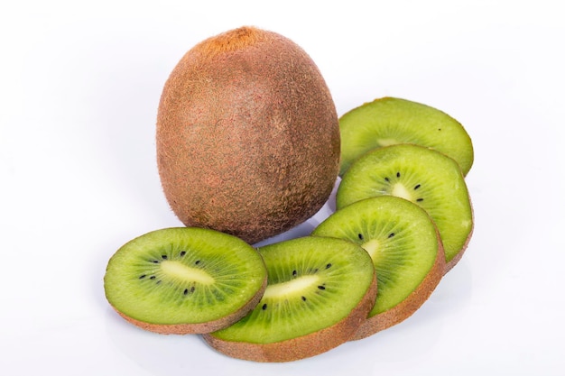 Whole and sliced kiwi