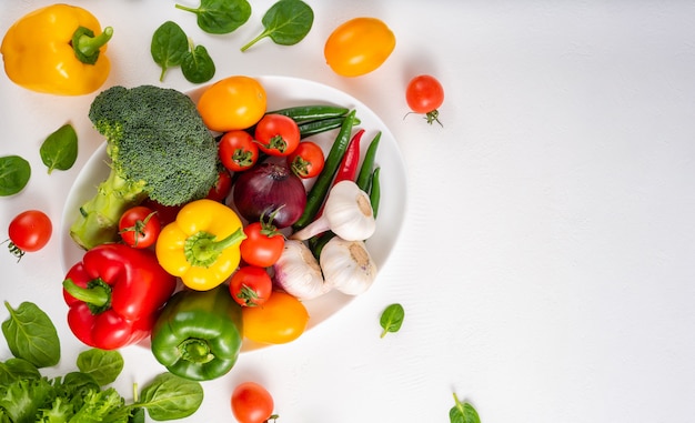 Whole vegetables on a white background, copy space.