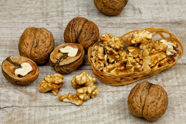 Whole walnuts and kernels on the table