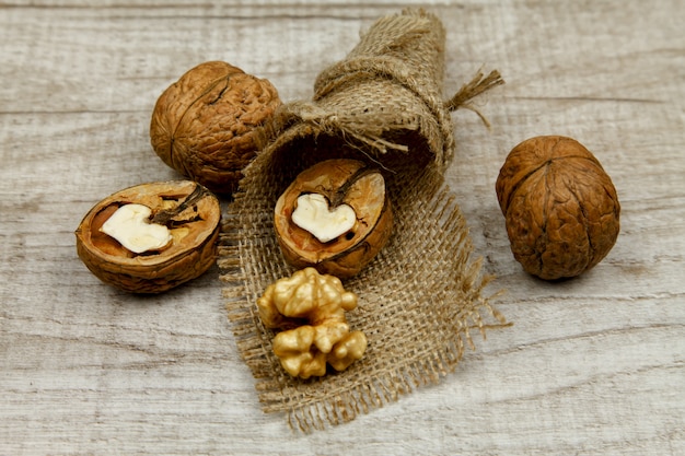 Whole walnuts and kernels on the table