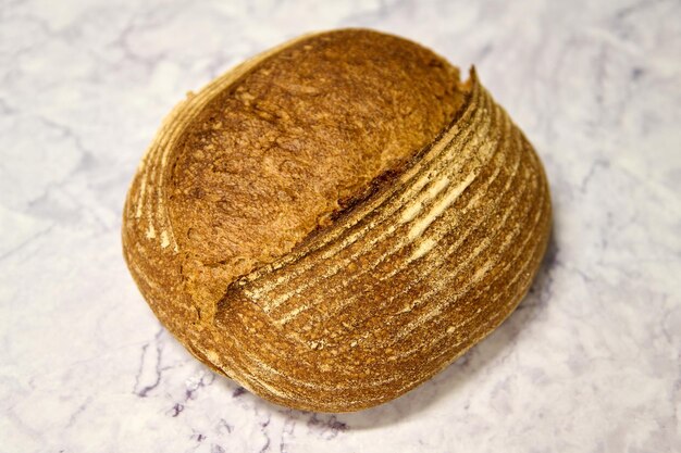 whole wheat bread on white marble