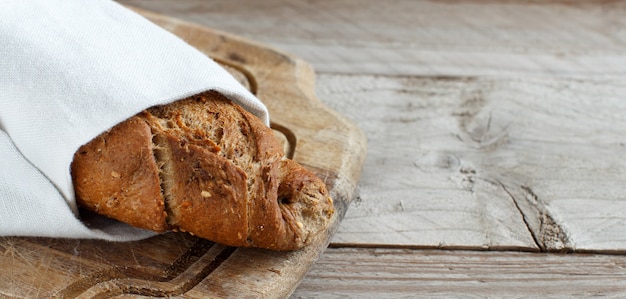 Wholemeal Bread on a Wooden Table top view