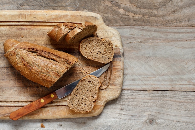 Wholemeal Bread on a Wooden Table top view