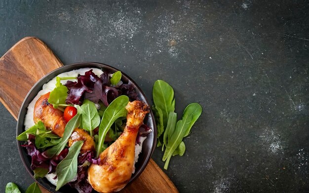 Wholesome mix of tender chicken leg and vibrant salad leaves