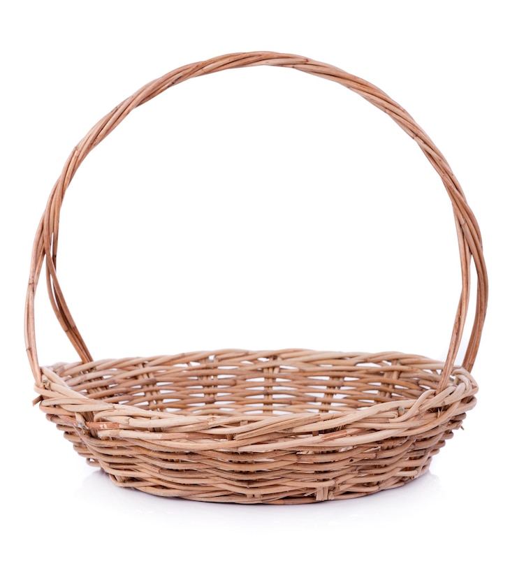 Photo wicker basket against white background