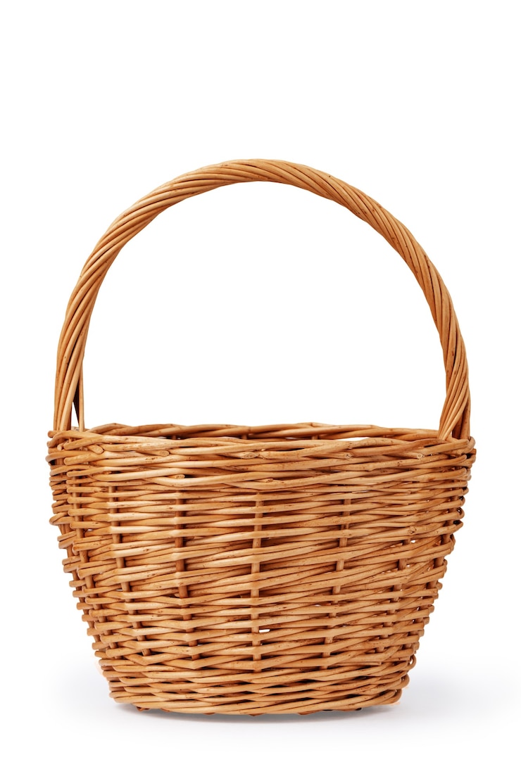 Photo wicker basket for berries made of willow twigs isolate on a white background