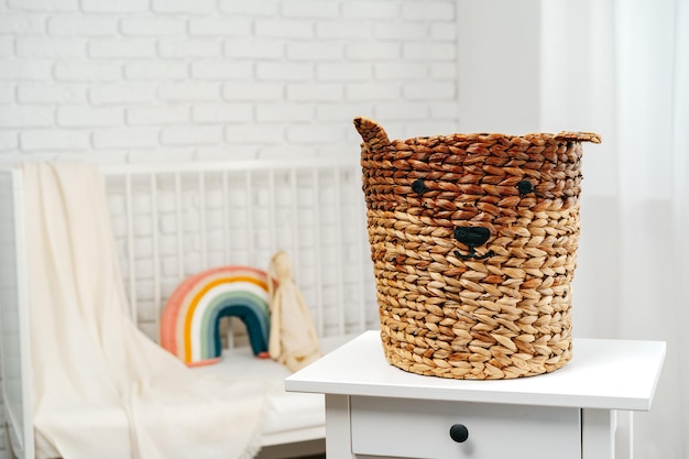 Wicker basket for toys in the childrens room