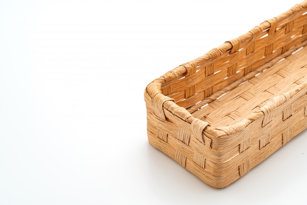 Wicker basket on white background