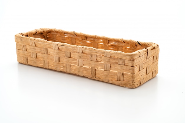 Wicker basket on white background