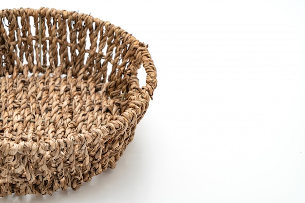 Wicker basket on white background