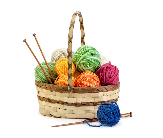 Wicker basket with balls of yarn