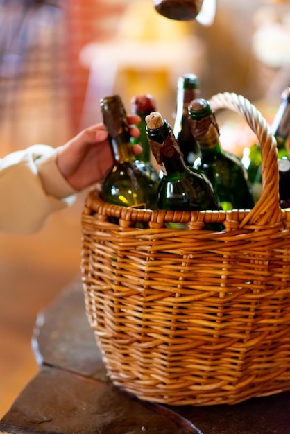 Wicker basket with bottles of wine