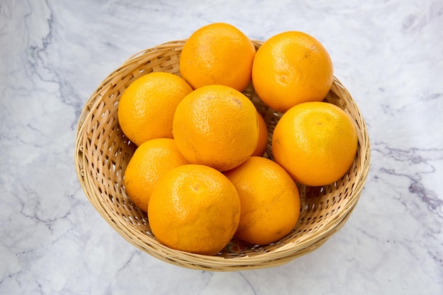 wicker basket with table oranges