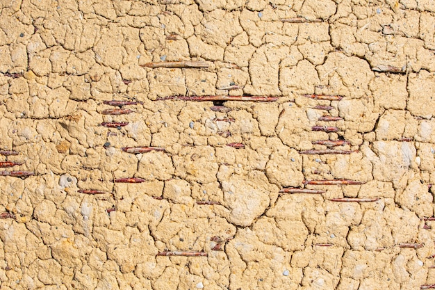 Фото Плетеная стена с глиной старого сельского сарая фермы