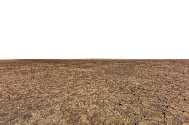 The wide angle of the cracked soil and the fresh blue sky are sparsely white clouds on the sunny day