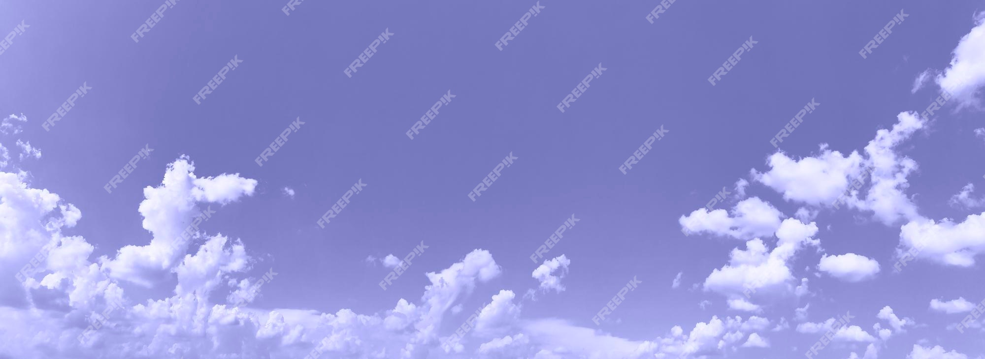 Premium Photo | Wide banner of wonderful sky with lot of beautiful small  clouds. creative sky background with copy space. trendy toning in color of  2022 year very peri.