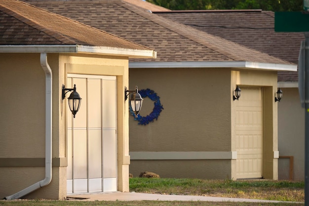 Wide garage double door and concrete driveway of new modern american house