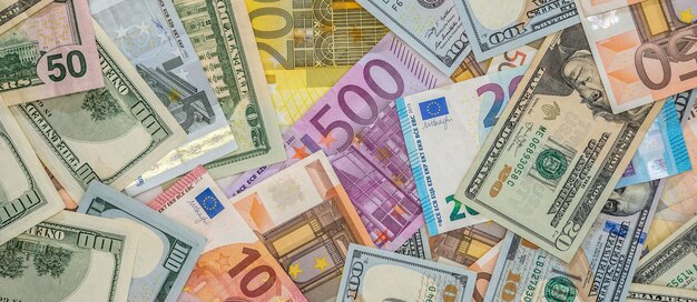 Wide long banner main world currency dollar and euro bills saving concept