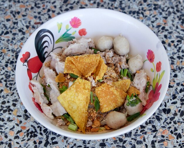 Wide rice noodles with vegetables pork