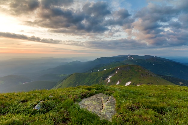 Wide summer mountain view at sunrise