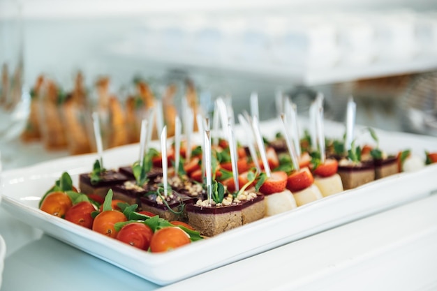 A wide variety of snacks on the table for guests Shrimp boiled pork various types of meat and other products