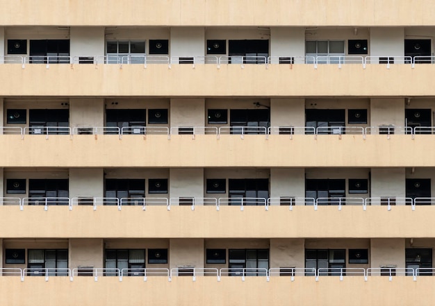 Wide view old orange apartment building