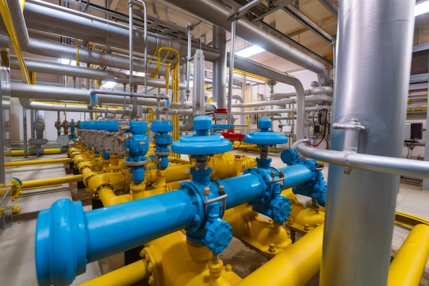 Wideangle view of an underground natural gas storage facility with pipes valves