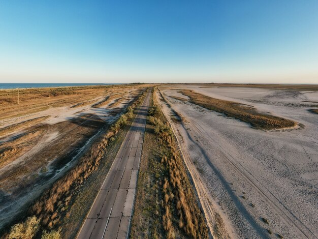 Wilderness road near the sea and bird's eye view