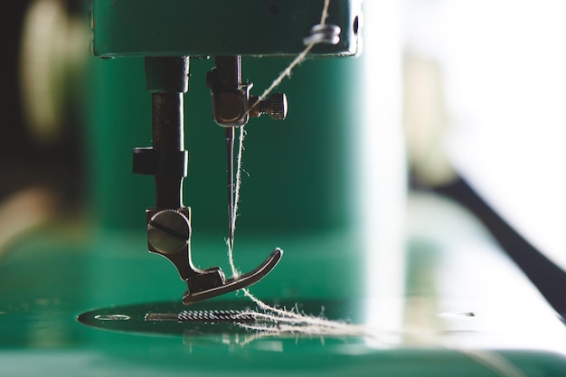 Winathena sewing machine closeup view of a needle and thread