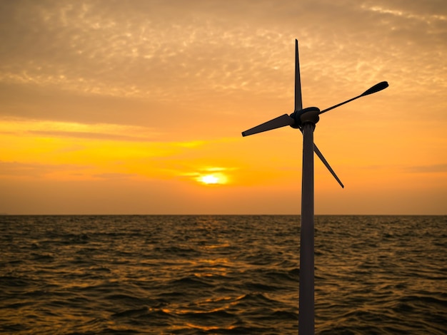 wind mill offshort sea sunset