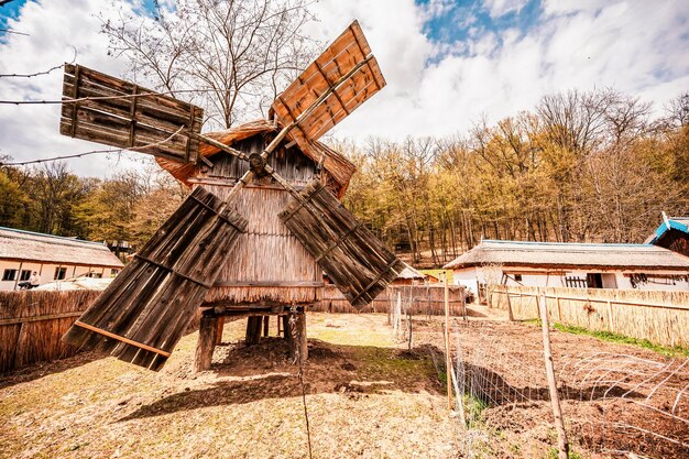 Wind mills from Astra old hause Museum Sibiu Traditional rustic houses in Astra complex Discover Romania Old traditional farm rustic house and dependencies