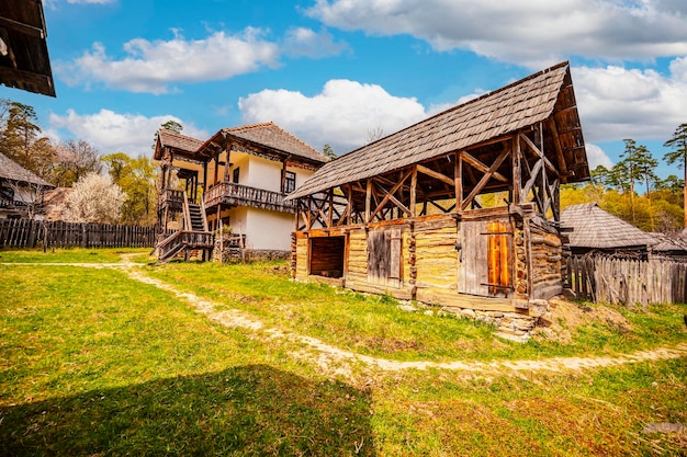 Wind mills from Astra old hause Museum Sibiu Traditional rustic houses in Astra complex Discover Romania Old traditional farm rustic house and dependencies