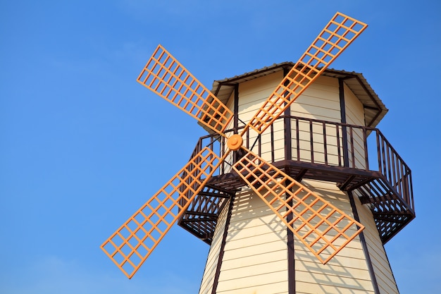 Wind turbine in blue sky