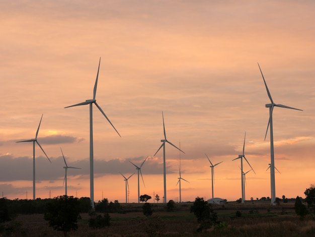 wind turbine power generator at sunset