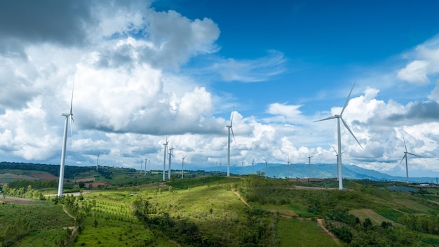 Photo wind turbines windmill energy farm windmill on blue sky puffy clouds