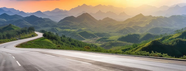 Winding Road through Mountainous Landscape at Sunset