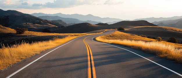 Winding Road through Mountains at Sunset