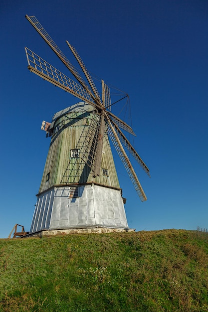 Windmill dutch type against blue sky