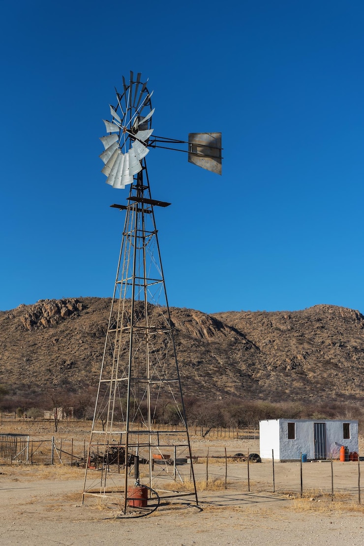 फोटो windmill on a farm in the erongo mountains namibia