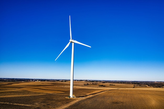 A windmill in a field photo