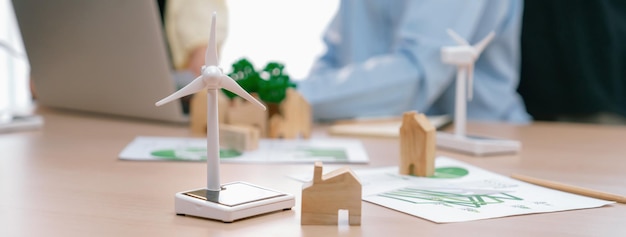 windmill model and wooden block was scatter around on the table delineation