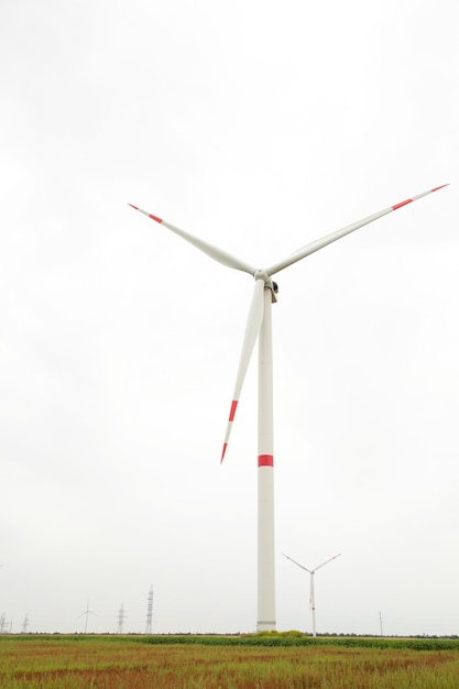 Windmills for electric power production on a cloudy day. Top view